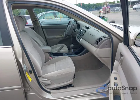 2002 Toyota Camry Le from USA, damaged, VIN 4T1BE30K42U106391